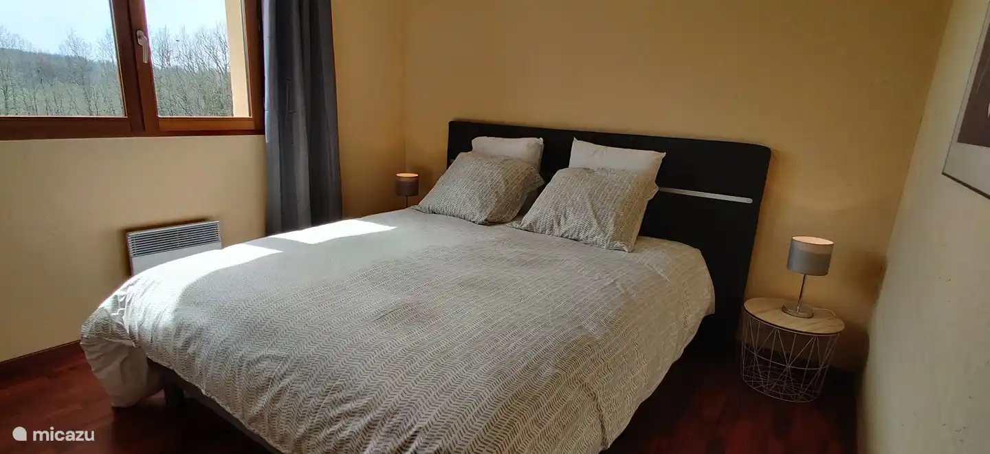 Another bedroom with a lovely double bed.