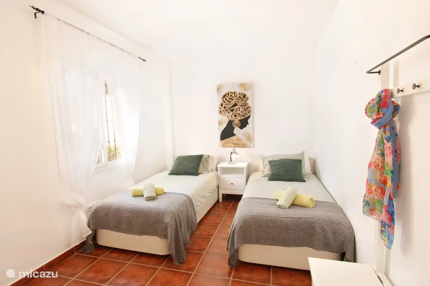 De tweede slaapkamer met 2 aparte bedden en airco. 