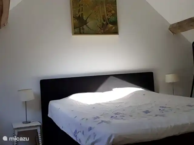 Location de Vacances France, Puy-de-Dôme, Teilhet, maison de vacances - Malguette Le grenier a deux chambres. L'une d'elles est aménagée en chambre et dispose d'un lit double.