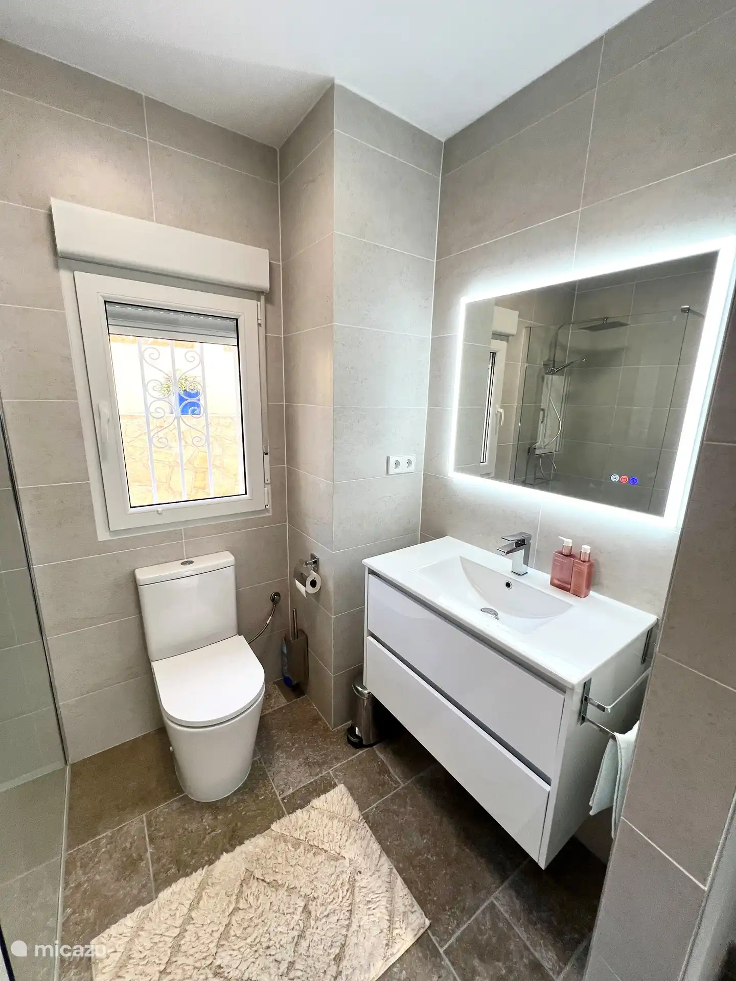 2nd bathroom with walk-in shower and heated mirror with bluetooth