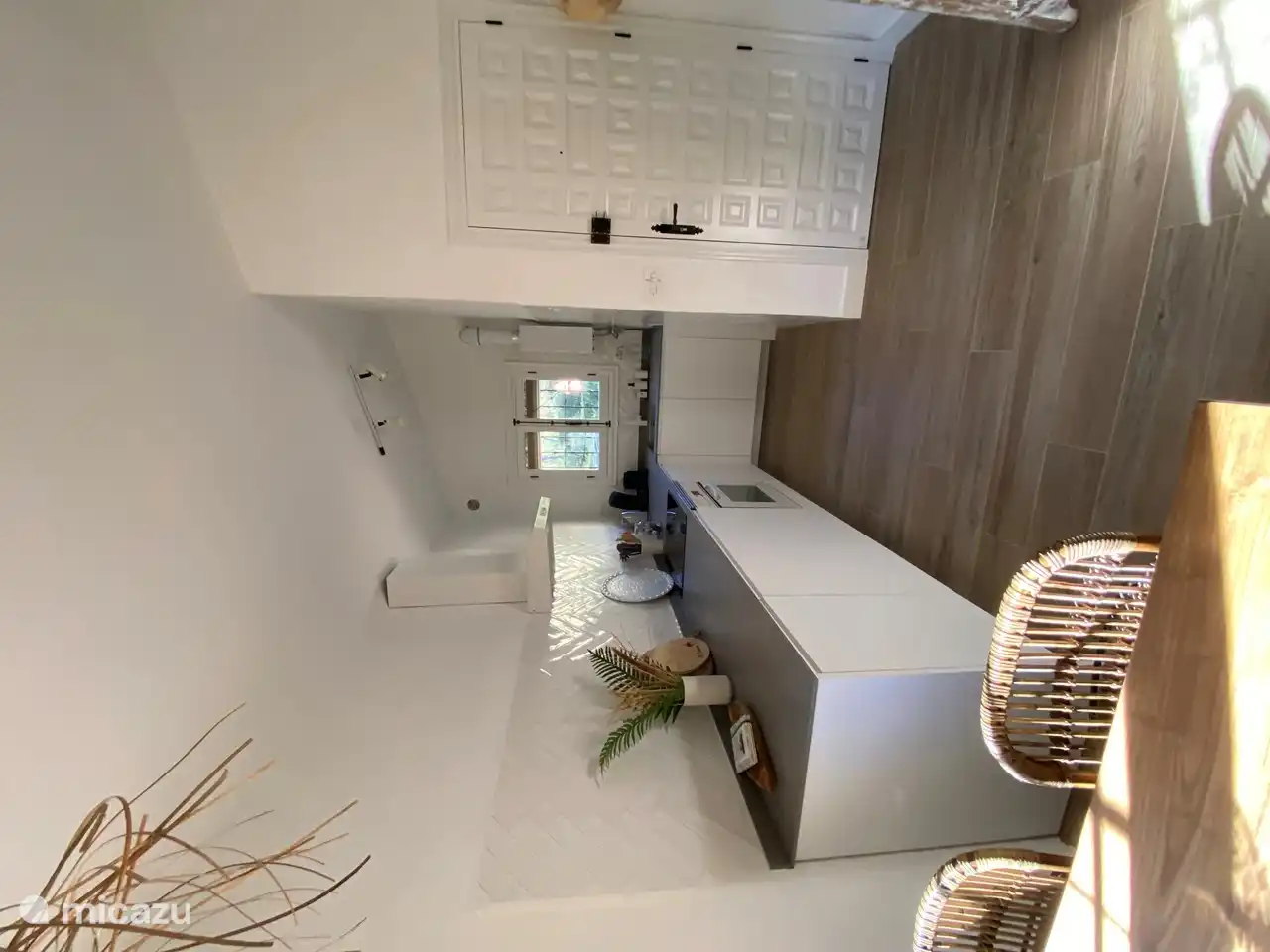 The new kitchen with appliances fridge / freezer, dishwasher, washing machine, oven and electric hob.