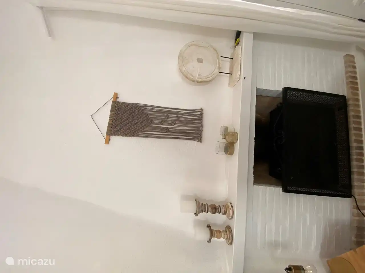 The atmospheric (electric) fireplace with remote control.