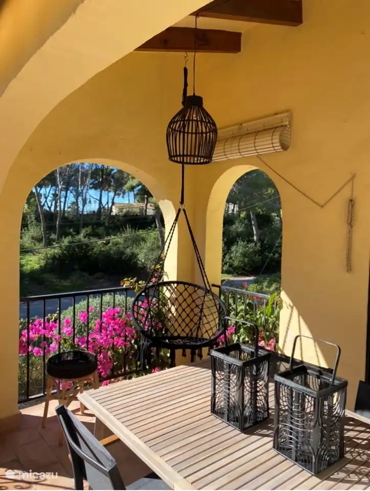 Enjoy the view and the wonderful weather from the hanging chair.