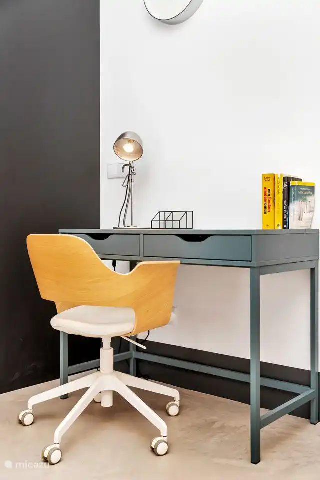 Desk with desk chair.