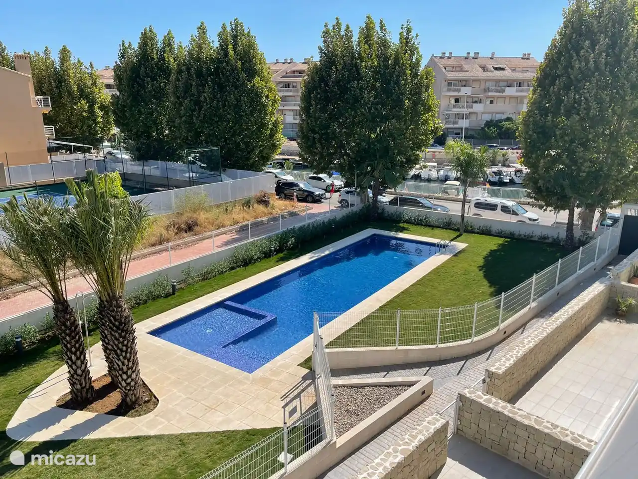From the balcony a nice view of the harbor and the swimming pool