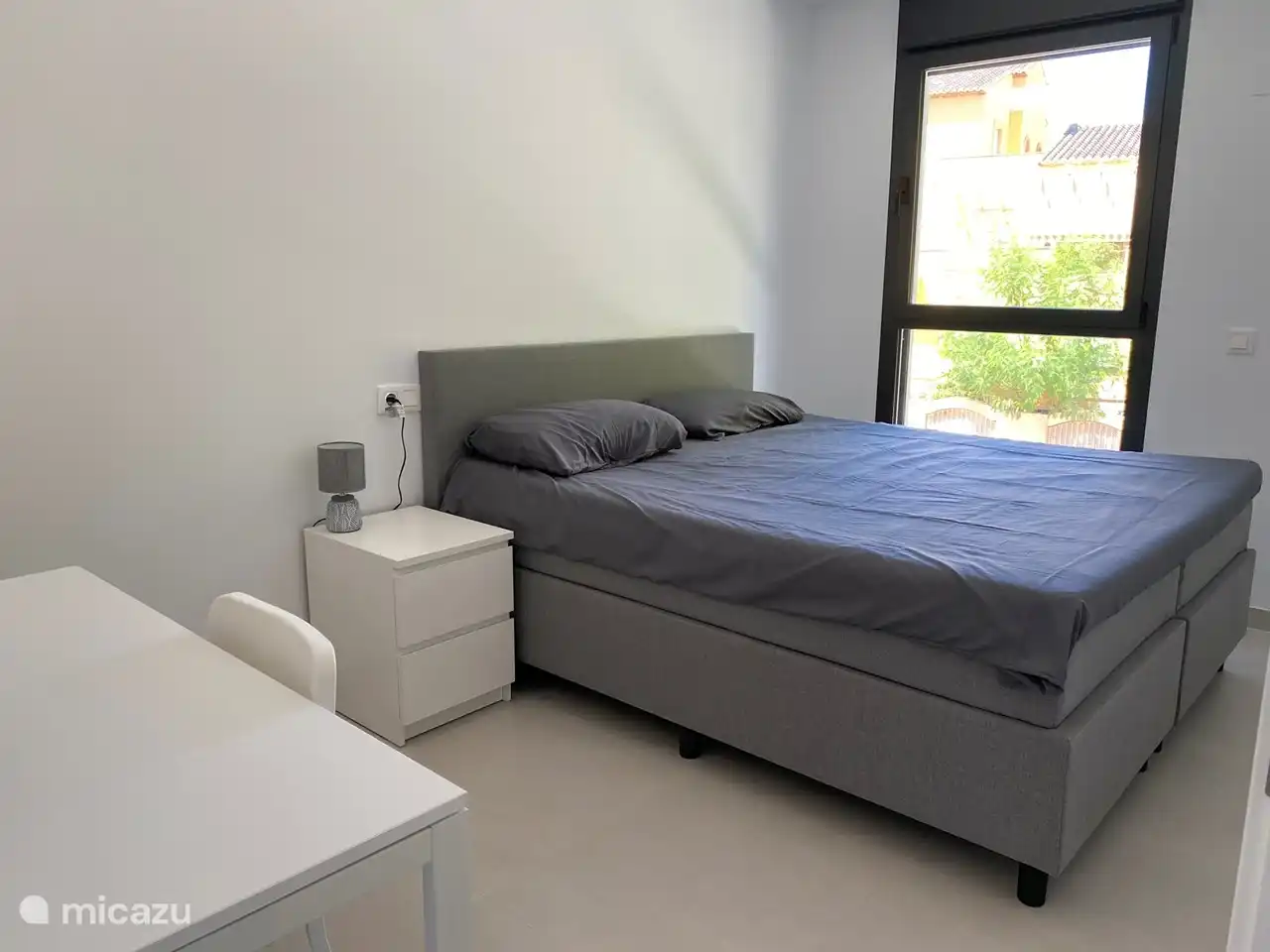 Bedroom 1 has a 180 x 200 meter bed.