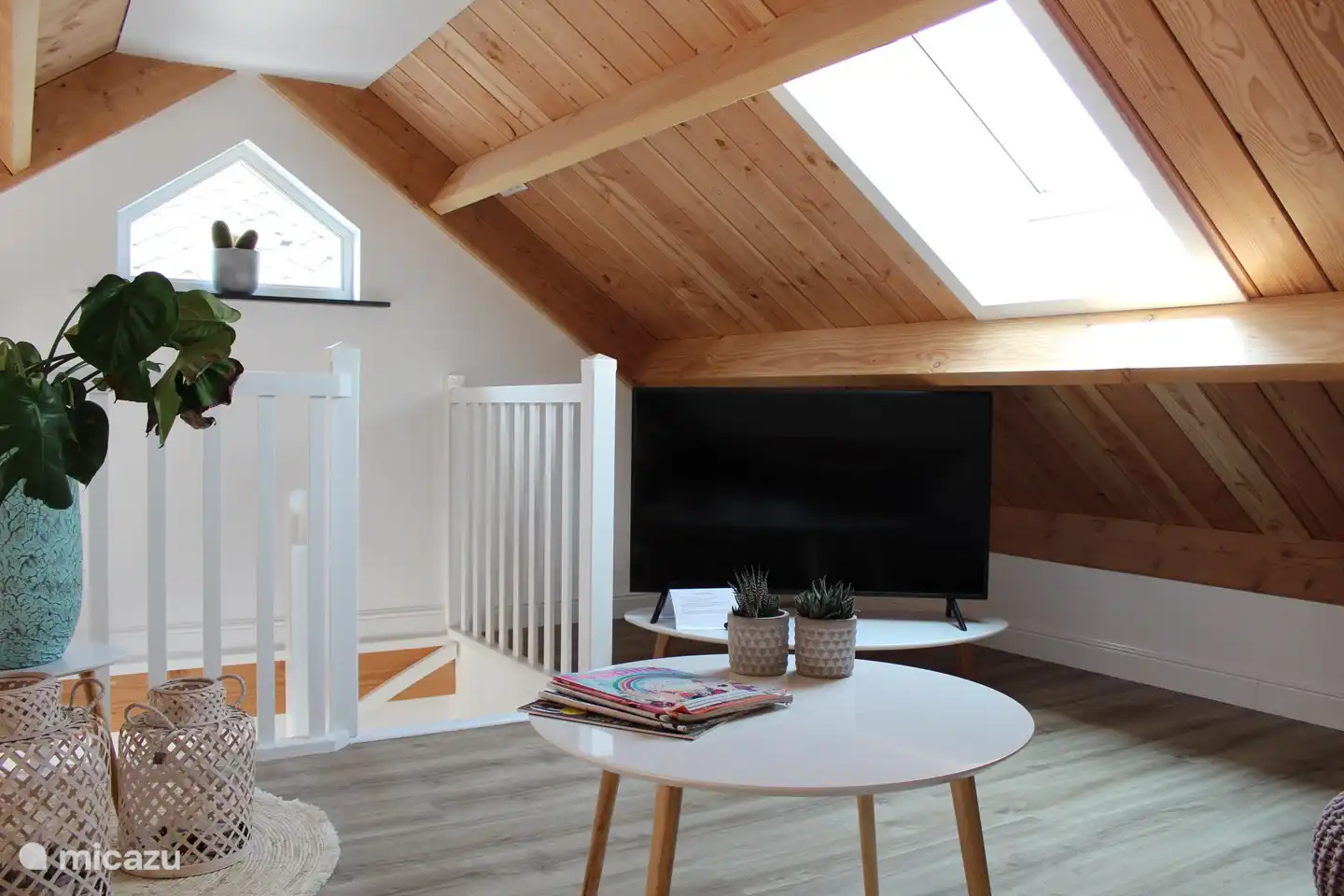 The cozy sitting area on top of the loft.
