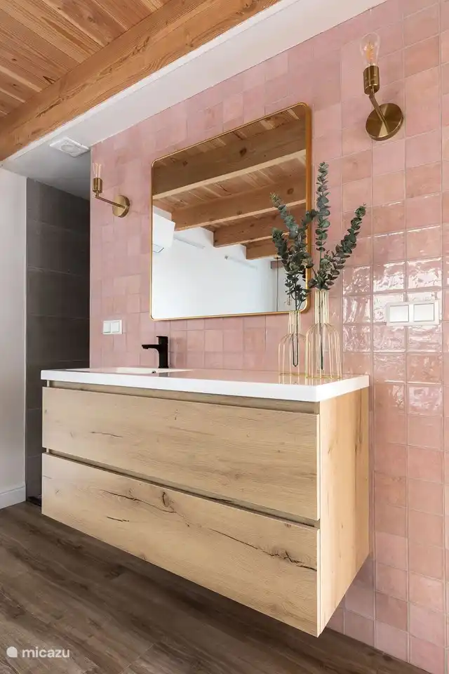 Bathroom adjacent to the bedroom.