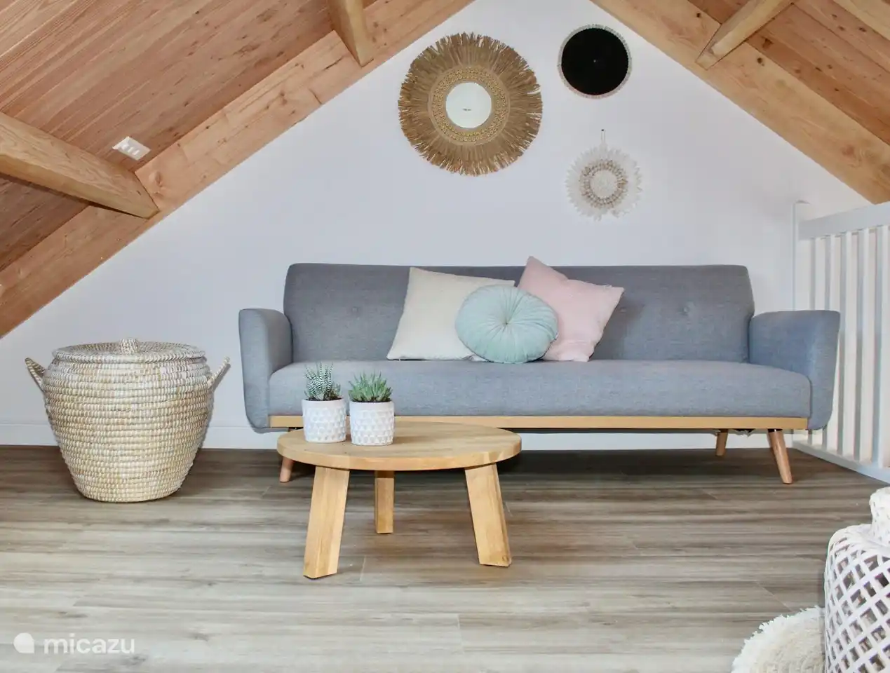 The cozy sitting area is on top of the loft.