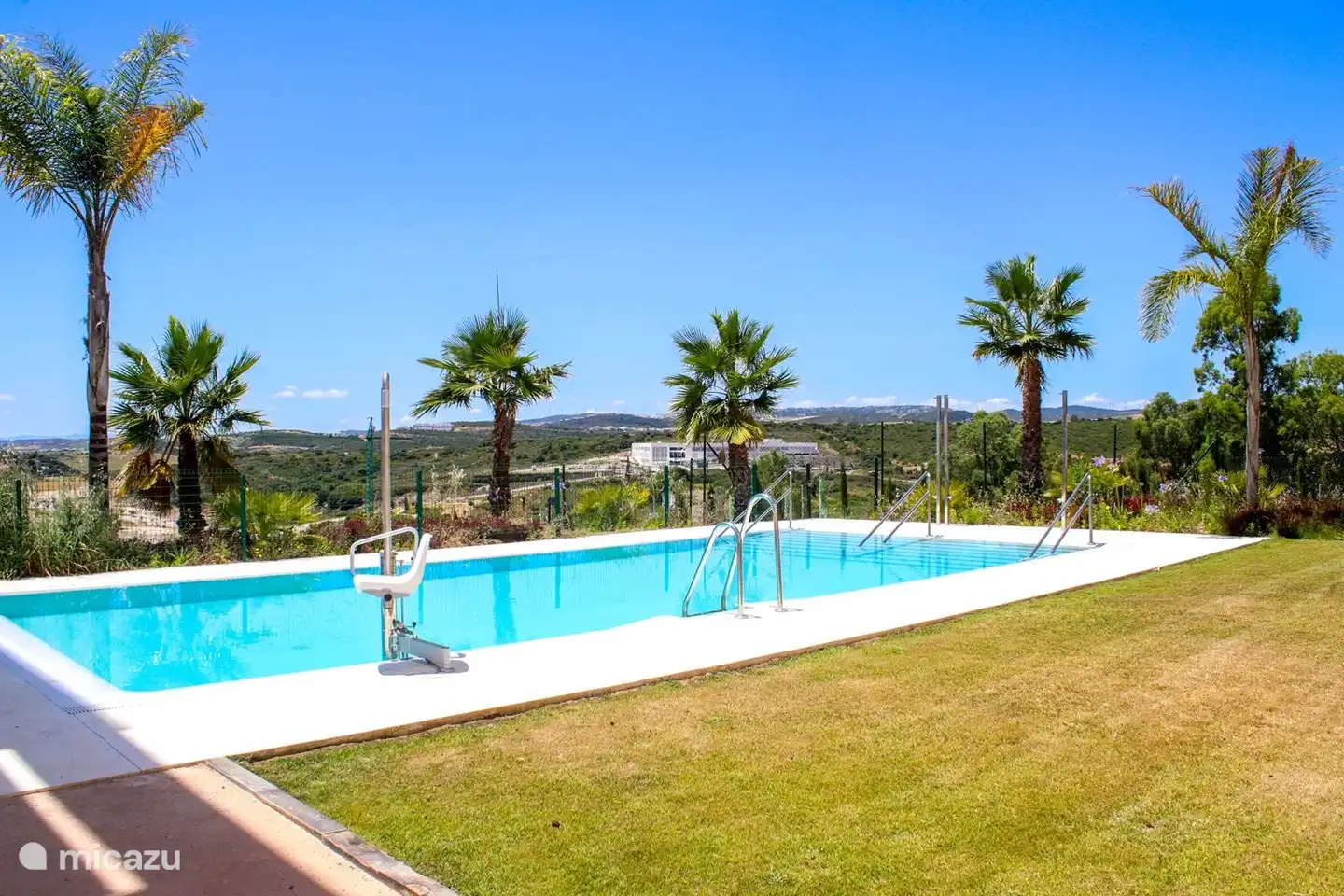 at the pool with garden and beautiful view!
