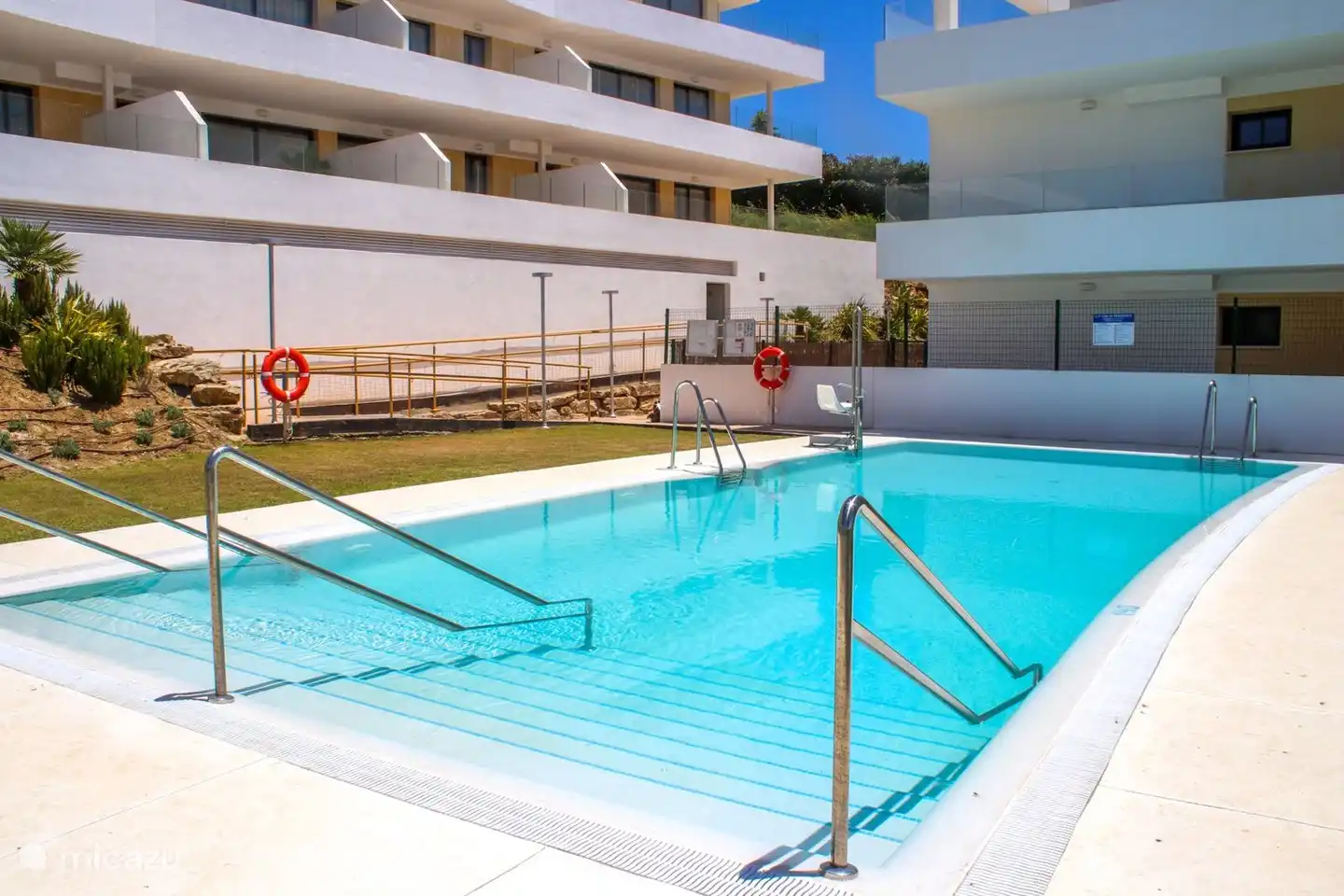 Swimming pool with disabled lift chair