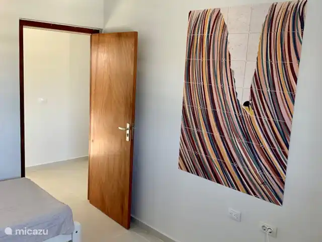 Villa Camillia Residence huren in Curaçao, Banda Ariba (oost), Kwartje - villa De derde slaapkamer met 2 x een eenpersoonsbed, airco en ventilator.