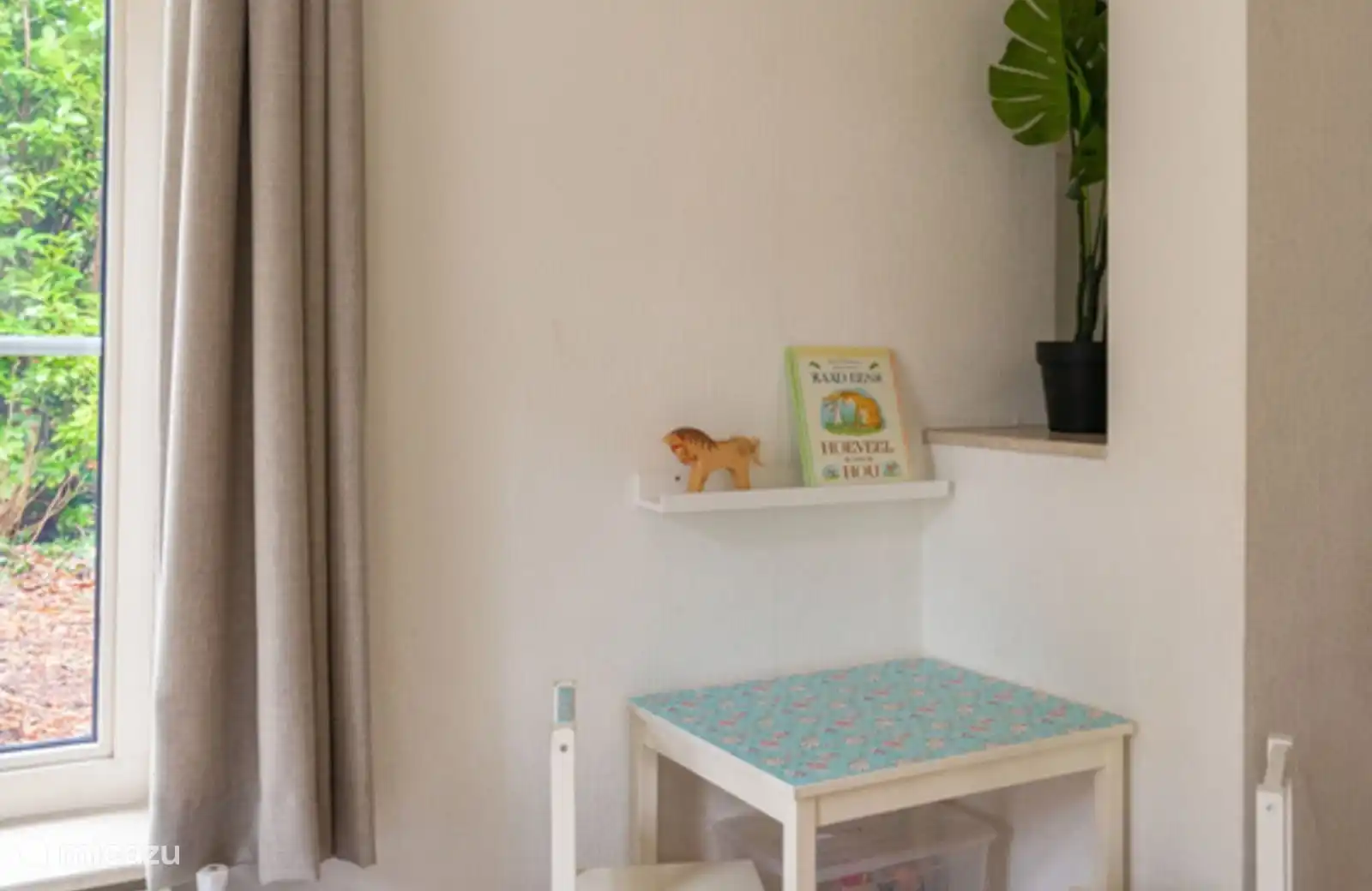 Ook voor de (kleine) kinderen is er een knus hoekje en goed gevulde speelgoed kisten