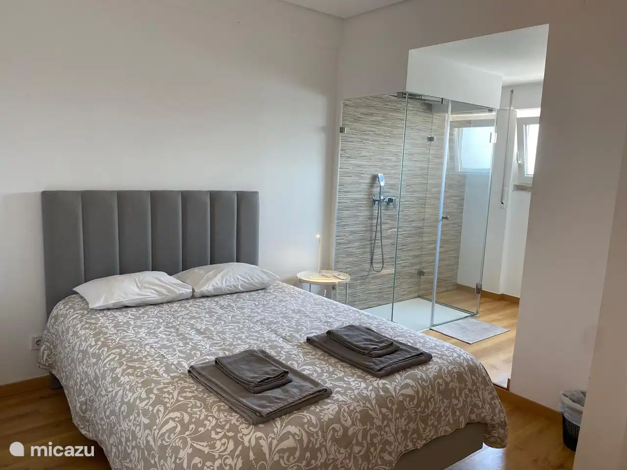 modern en-suite bedroom with river views