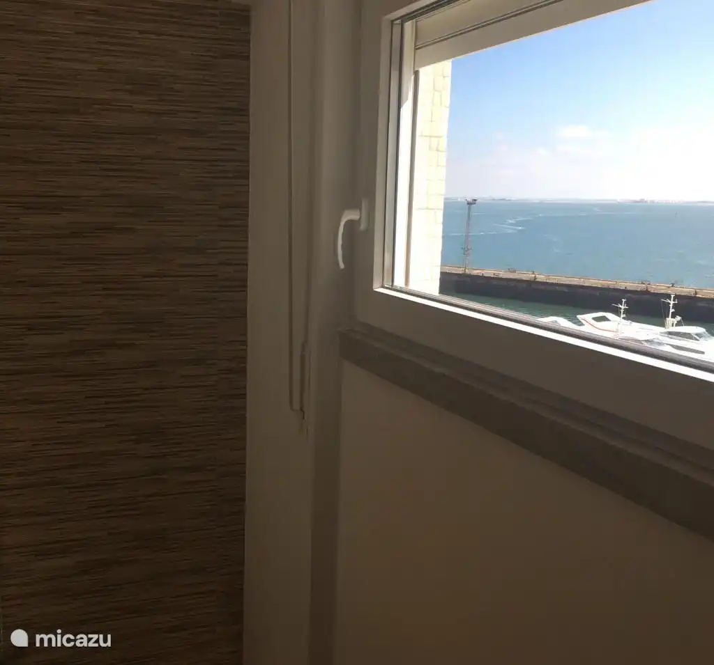 modern en-suite bedroom with river views