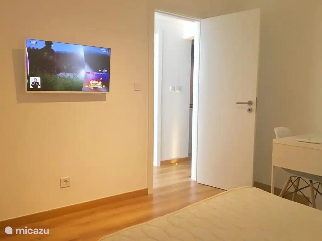 modern en-suite bedroom with river views