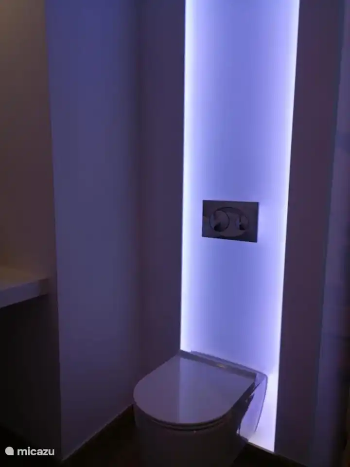 modern en-suite bedroom with river views