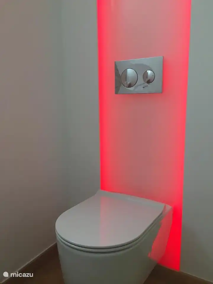 modern en-suite bedroom with river views