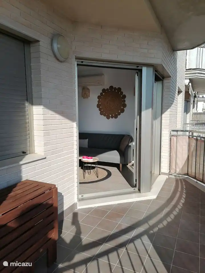 You can walk straight into the living room from the balcony.