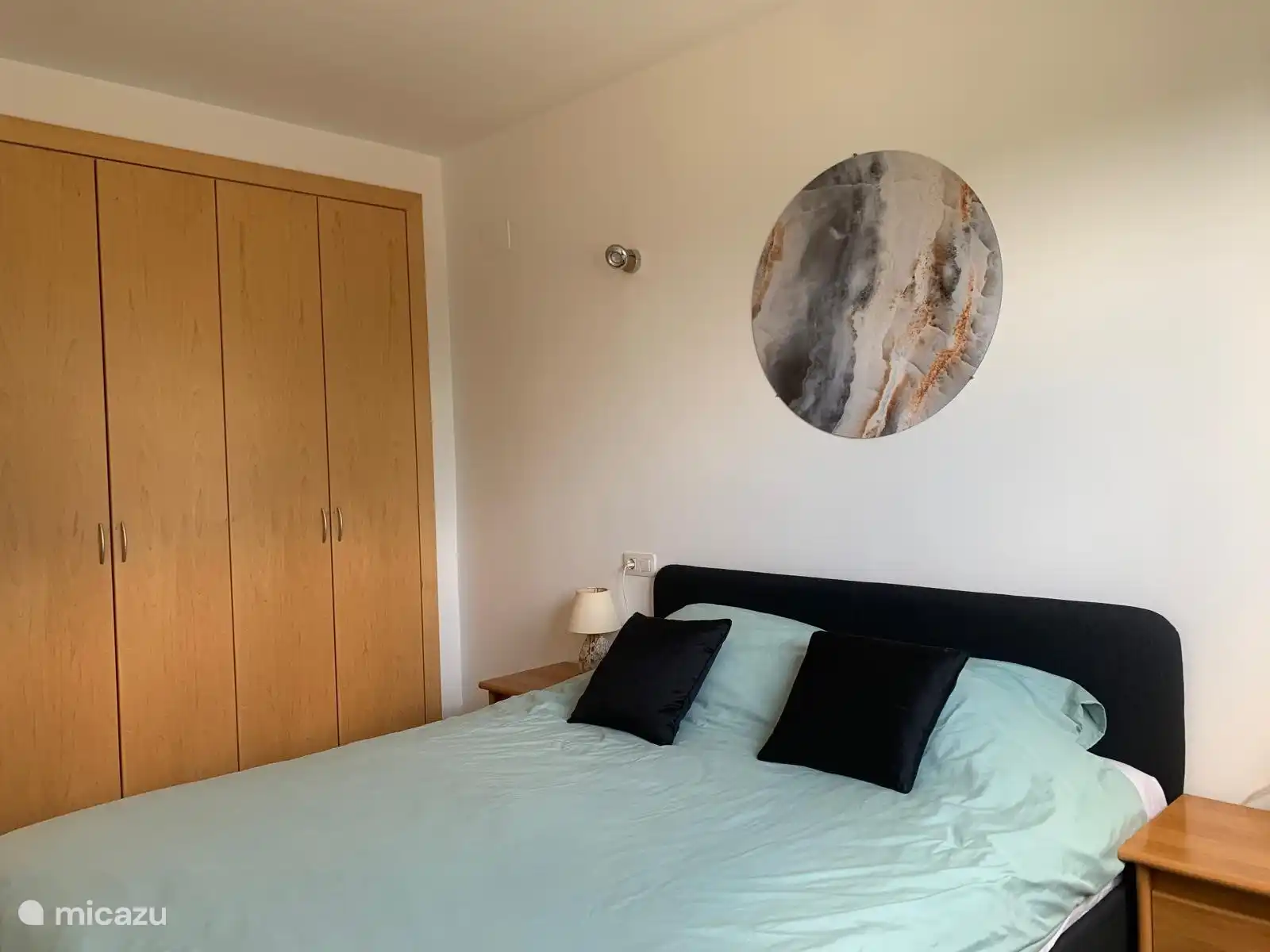 Double bed with large closets

