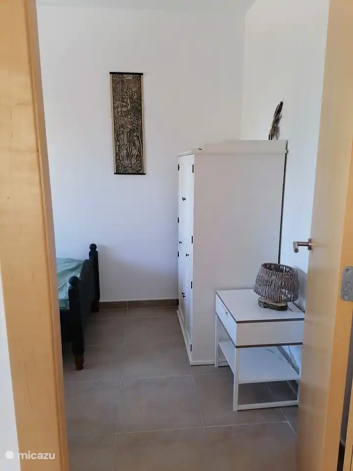 bedroom 2 with cupboard (with toys)