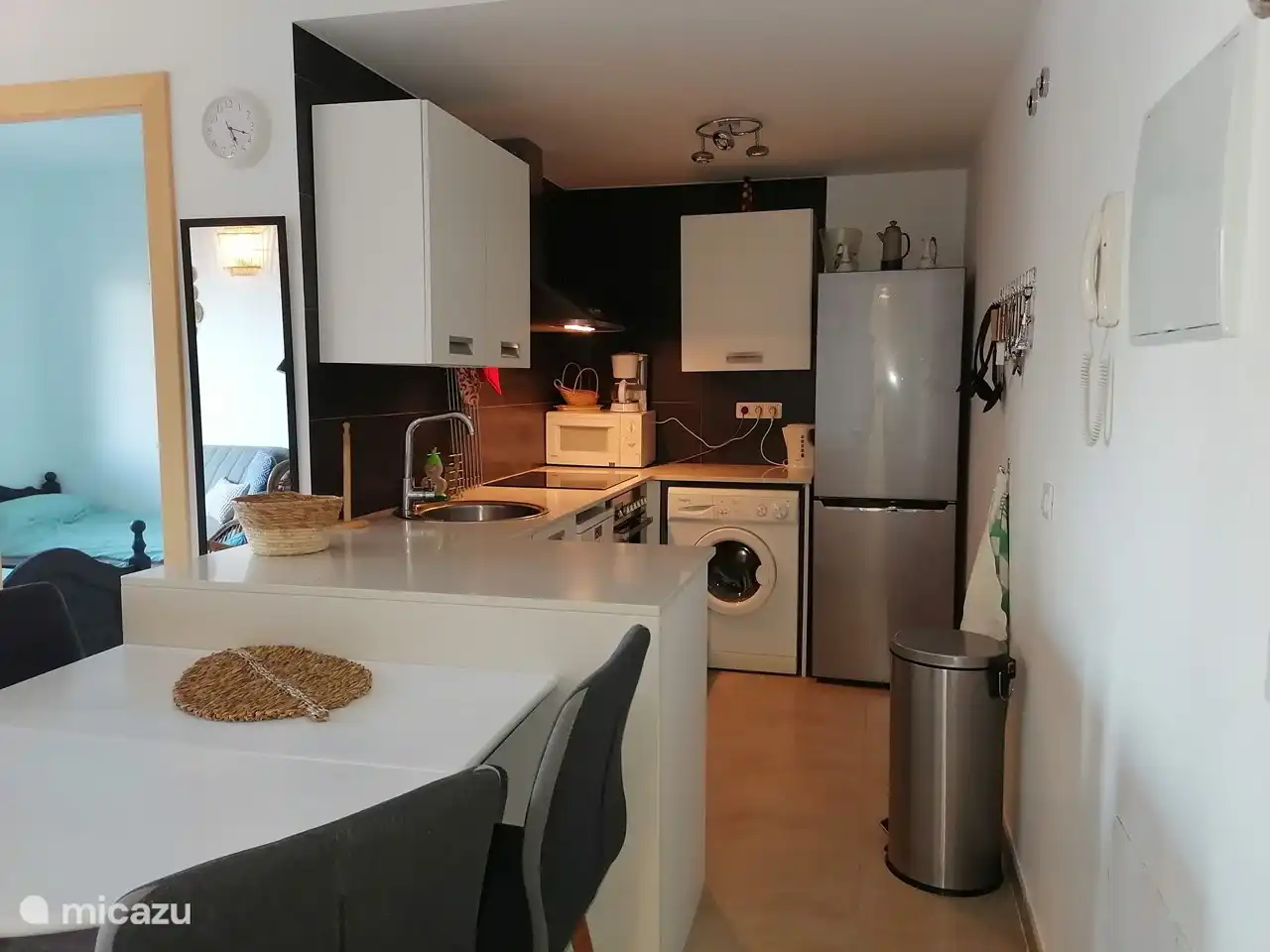 Dining table and kitchen