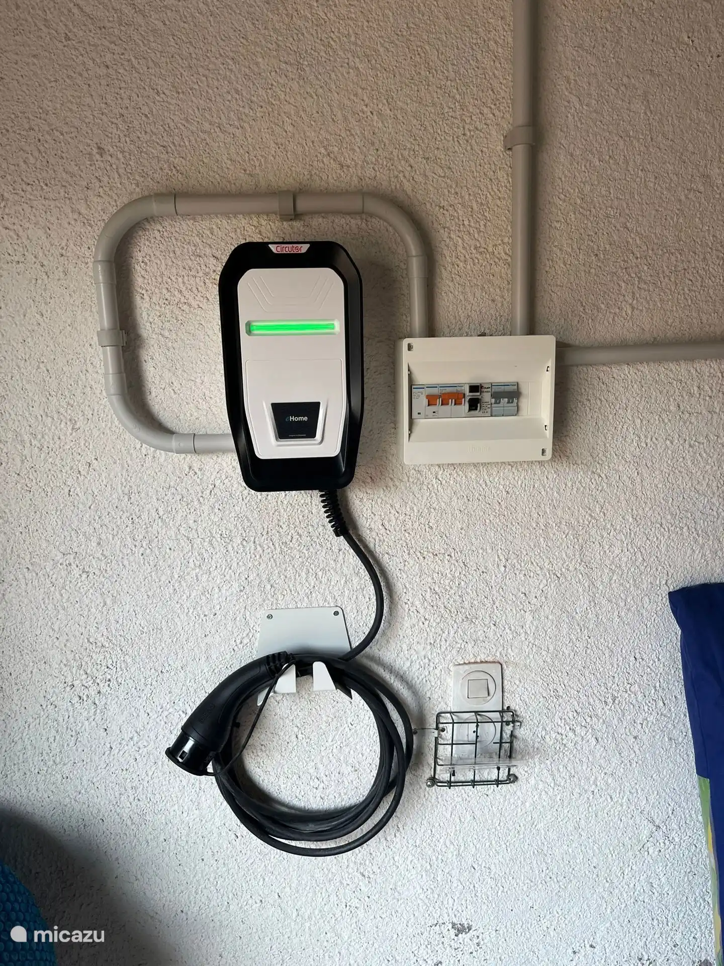 Charging system for electric vehicles in the garage