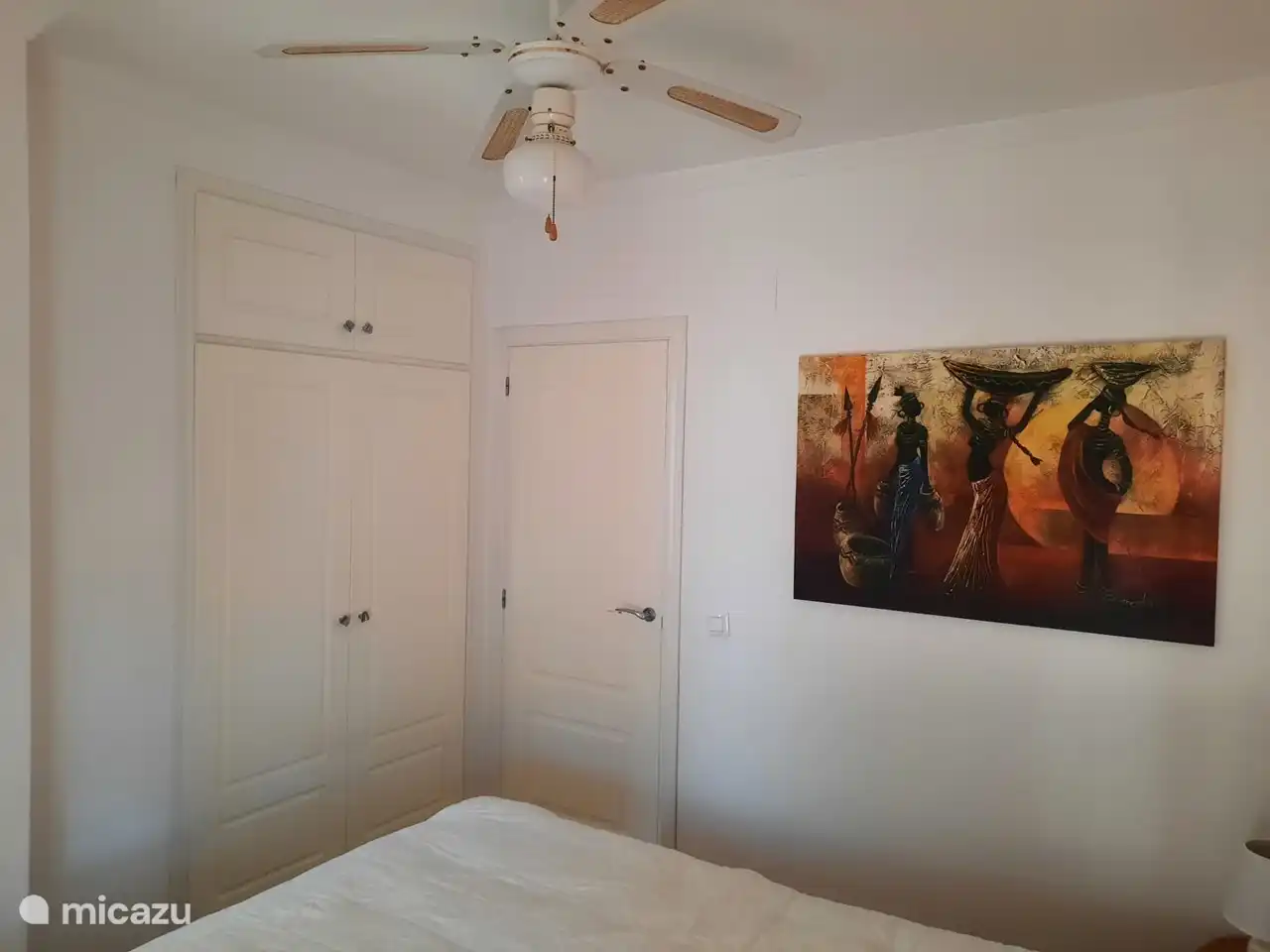 Bedroom 1 with one large built-in wardrobe.