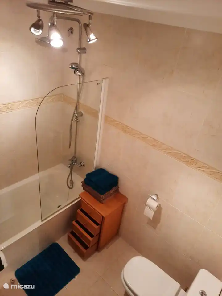 Bathroom 2 with bath / shower, sink and toilet.