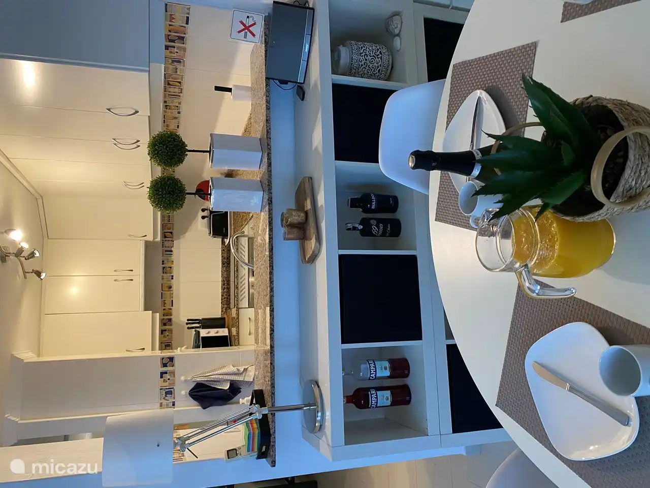 The dining room with storage cupboard.