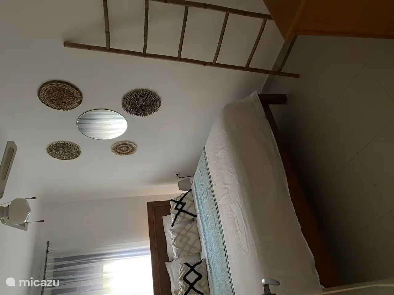 Bedroom 2 with 1 double bed, built-in wardrobe and chest of drawers.
a fan with 3 speeds.