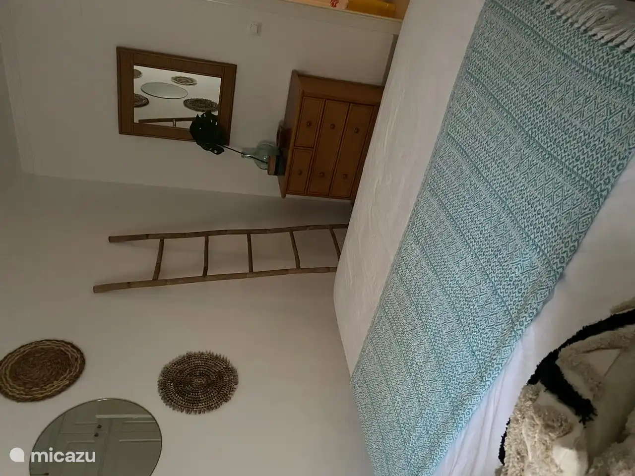 Bedroom 2 with 1 double bed, built-in wardrobe and chest of drawers.