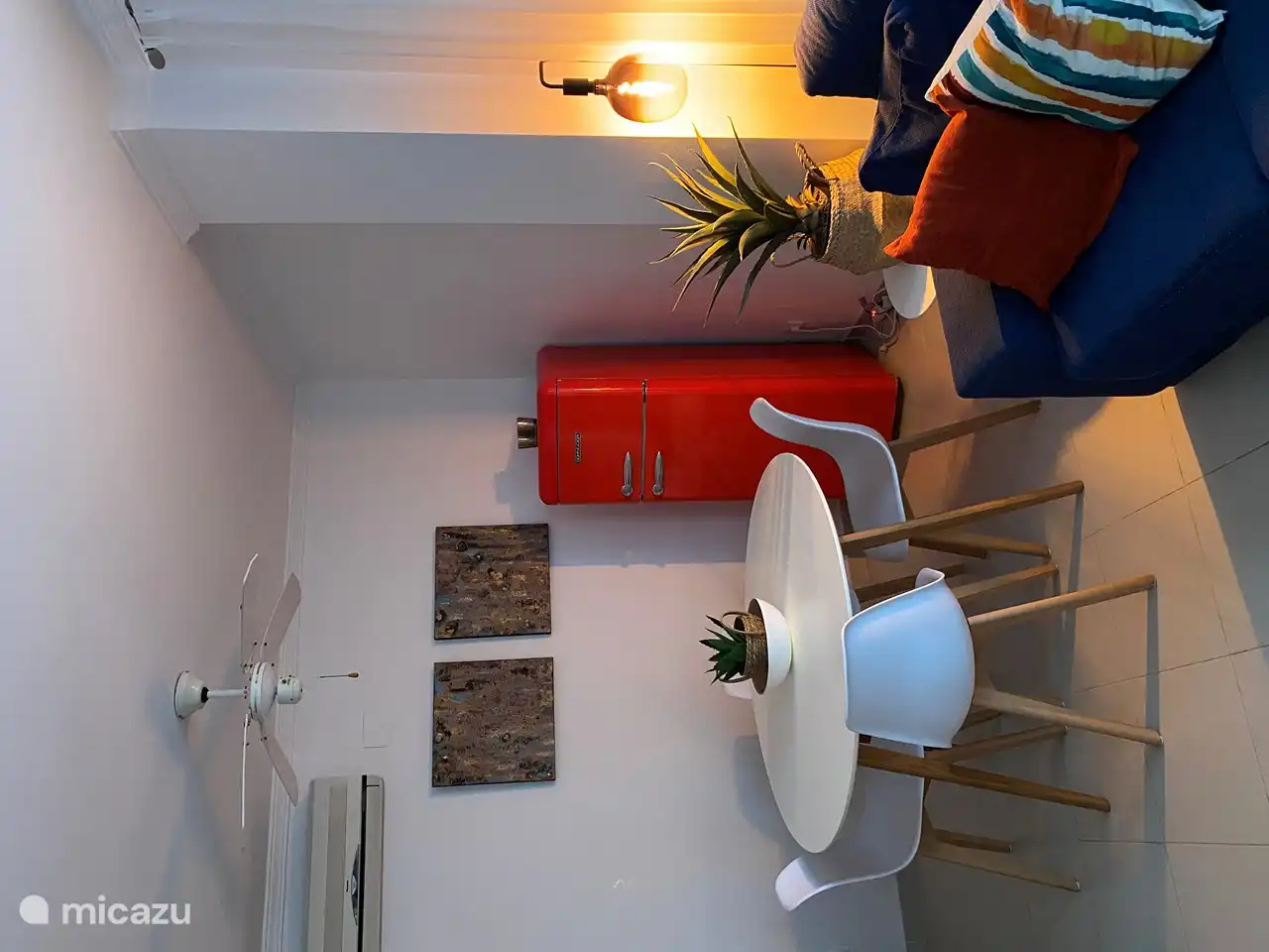 The dining room with extra refrigerator and separate freezer.