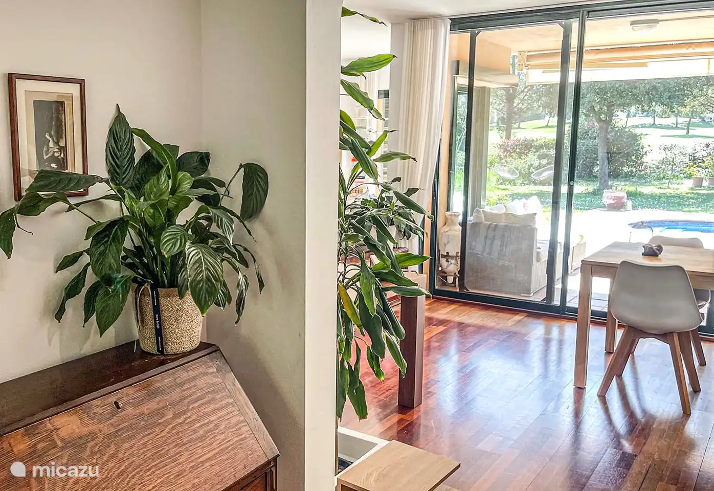 hall, living room with the kitchen on the left