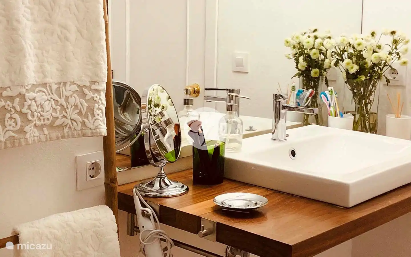 bathroom, both bathrooms have a shower