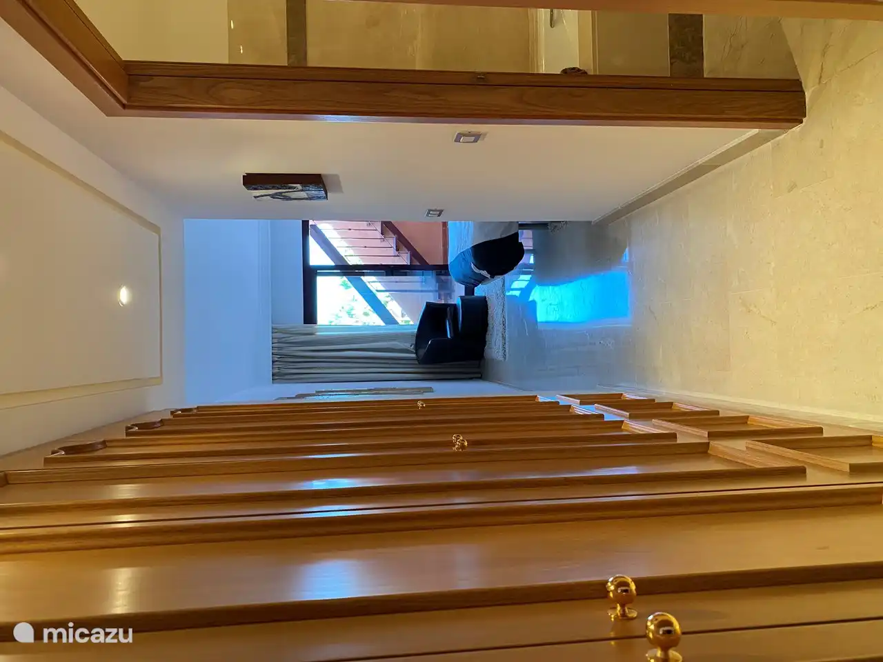 hall to the bedroom and bathroom. here are the wardrobes