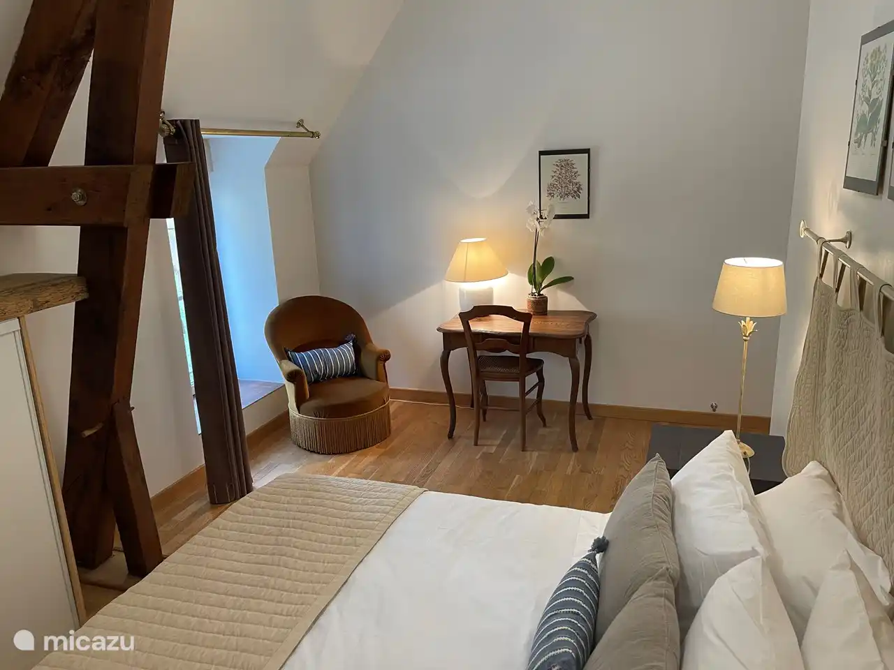 Das zweite Schlafzimmer mit Doppelbett befindet sich im ersten Stock.