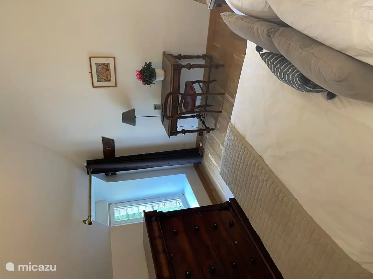 Das dritte Schlafzimmer mit Doppelbett befindet sich im ersten Stock.