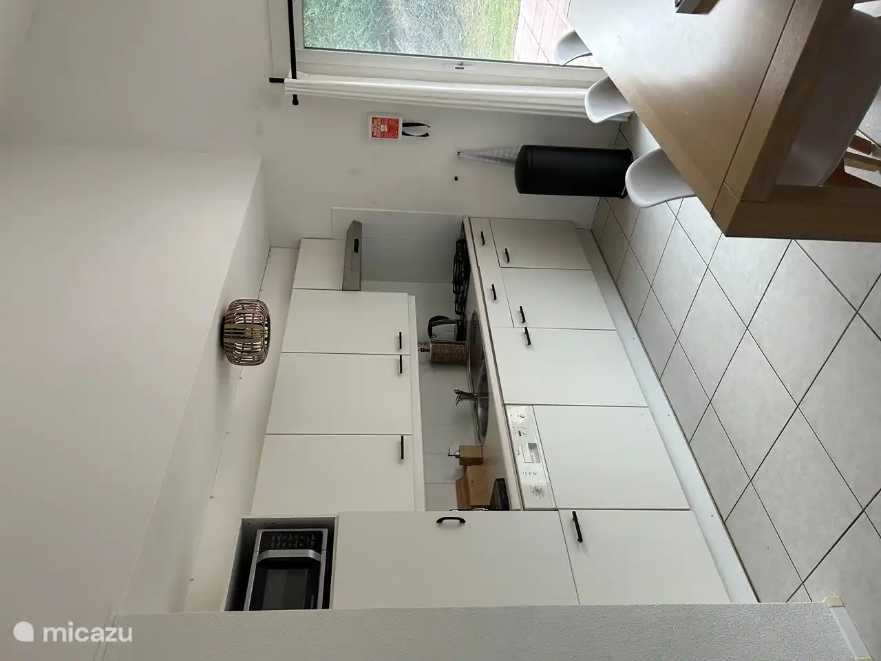 Cocina totalmente equipada con lavavajillas y cafetera Nepresso.