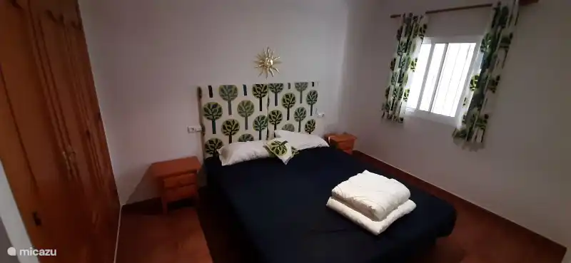 Schlafzimmer mit Doppelbett