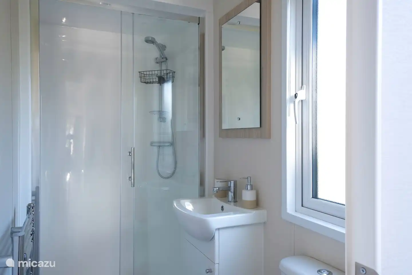 Bathroom with shower and toilet.