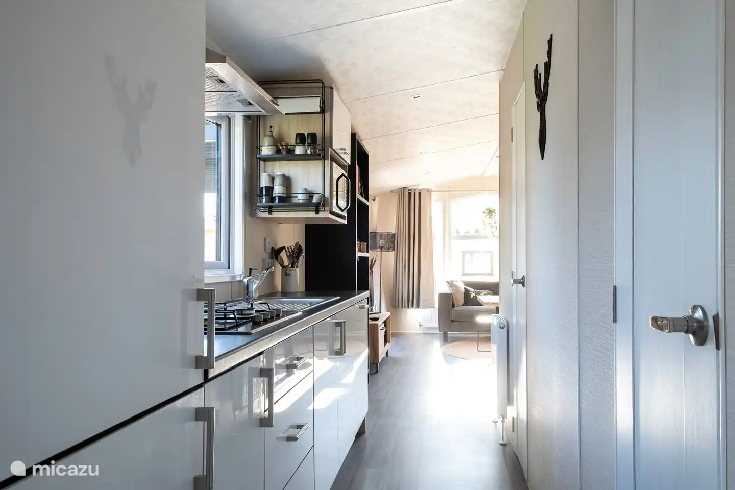 Nice kitchen with all conveniences, dishwasher, combi oven, 4 burner stove, coffee maker, Nespresso, kettle.