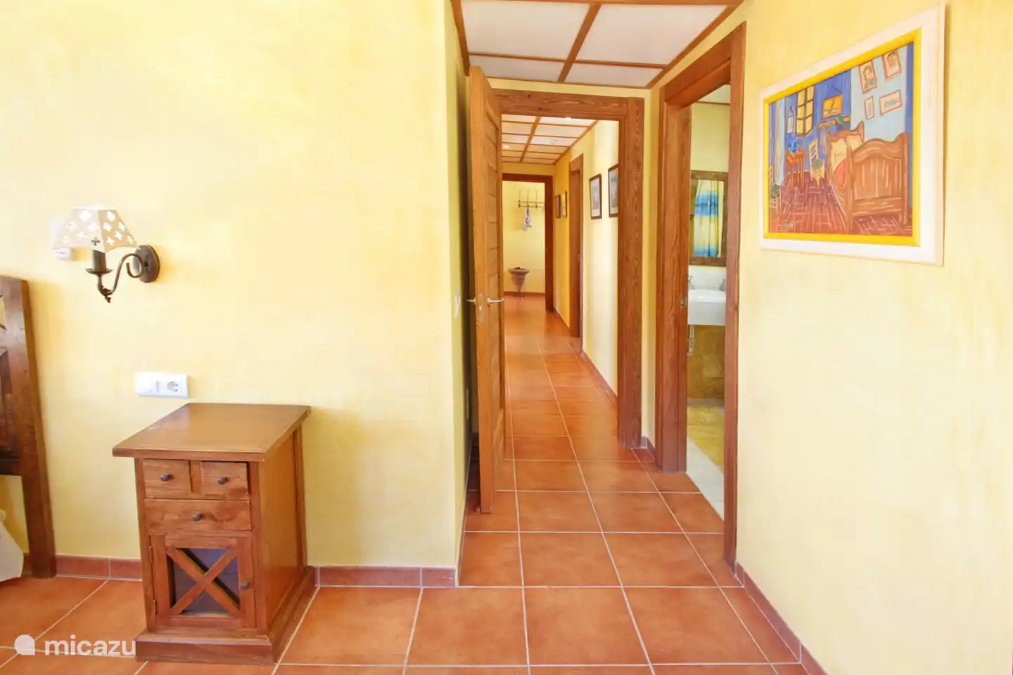 This bedroom with private bathroom can be completely closed off from the other bedrooms and second bathroom. (FYI...that Van Gogh isn't real, but you probably guessed that already...)