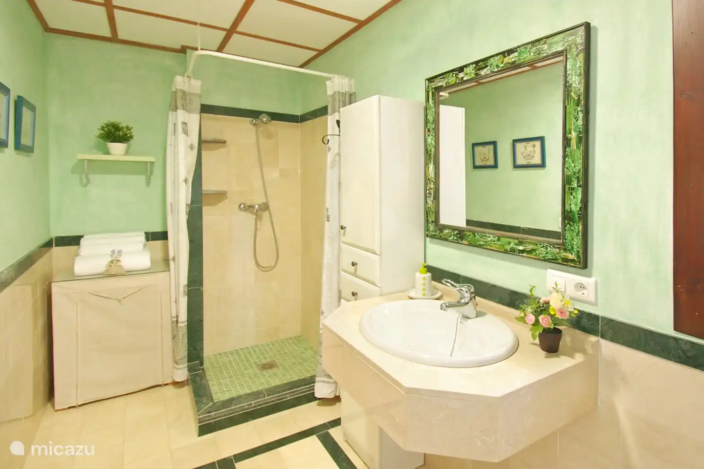 The second bathroom also has a shower, toilet, bidet and sink. The hot water throughout the house is generated by means of solar panels.