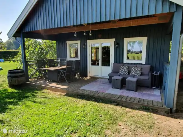 Het Griet en Países Bajos, Güeldres, Doesburg - casa vacacional La terraza en la parte trasera da mucha privacidad y una hermosa vista de las liebres que puedes ver todas las mañanas.