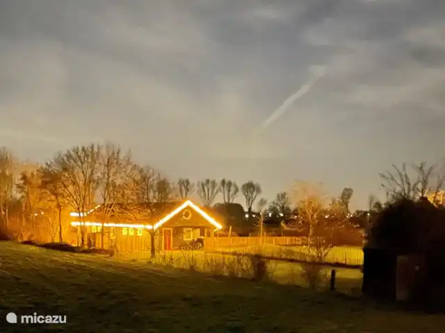 Het Griet en Países Bajos, Güeldres, Doesburg - casa vacacional Impresión fotográfica con una velocidad de obturación lenta, en una oscura tarde de invierno.