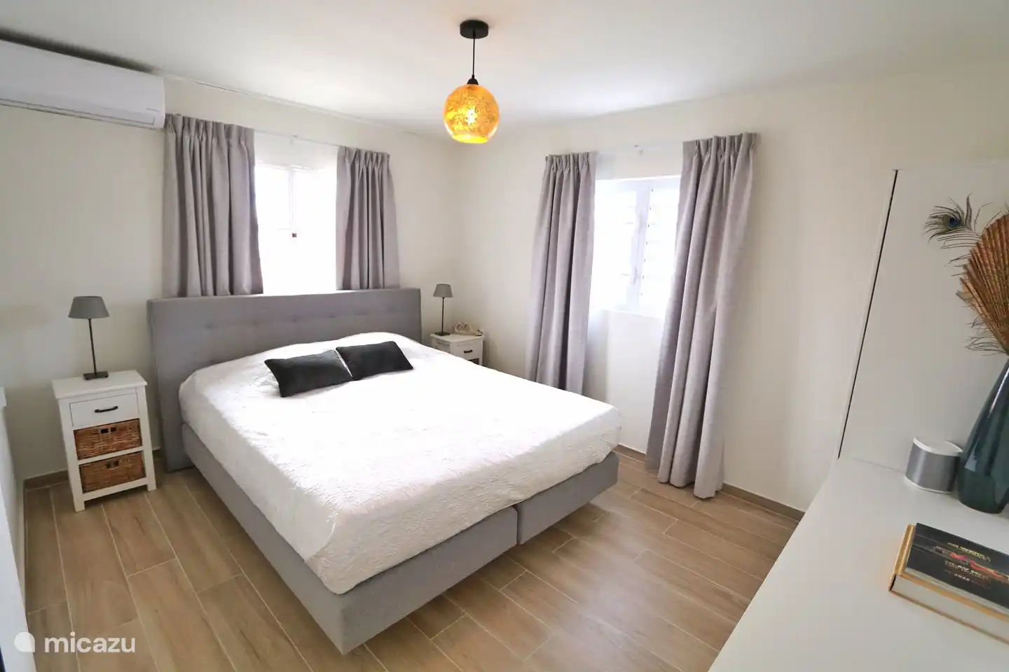 master bedroom 1 with king-size bed and connecting bathroom