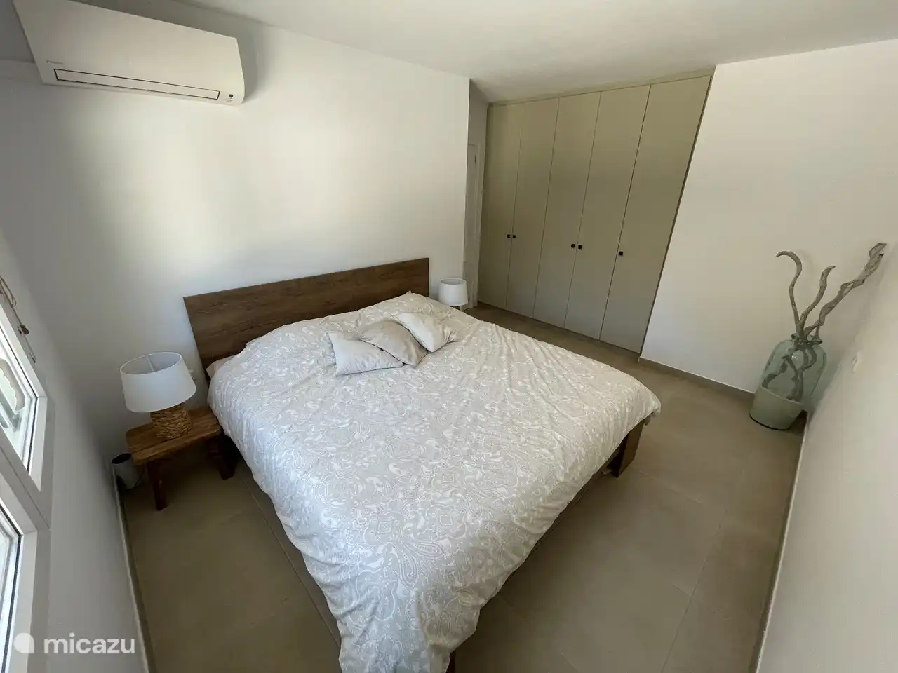 Chambre des maîtres avec air conditionné