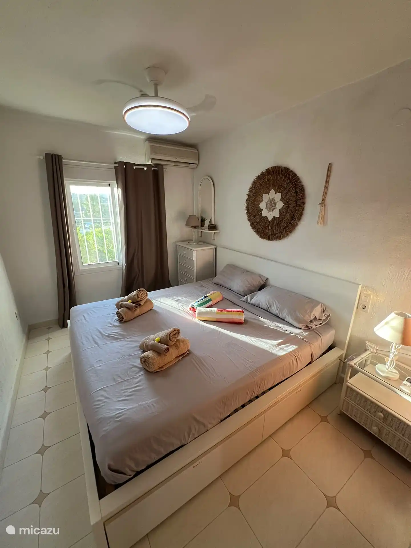 Main bedroom with very large bed.