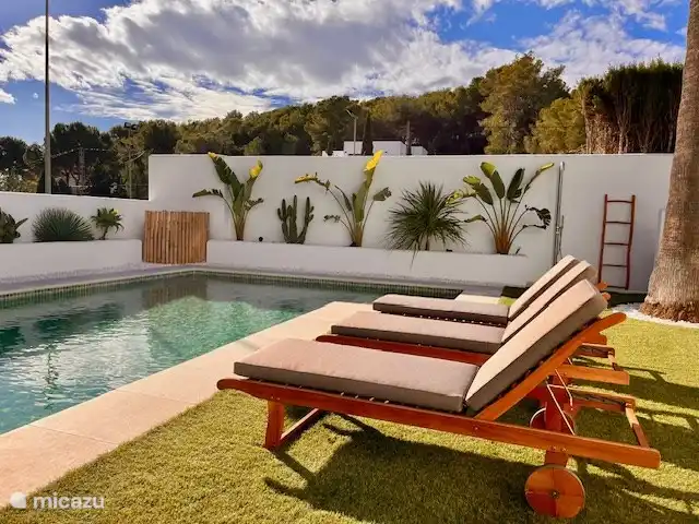 Various lounge areas around the pool